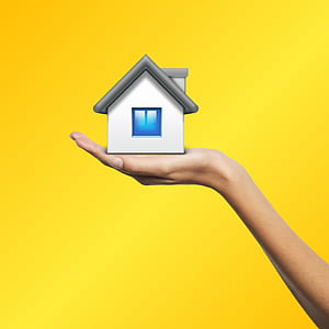 person holding white miniature house illustration thumbnail