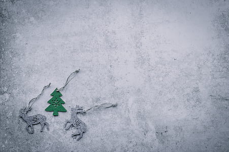 three gray and green deer and pine tree ornaments thumbnail
