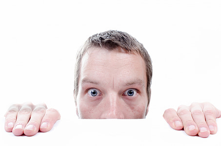 photo of man peeking thumbnail