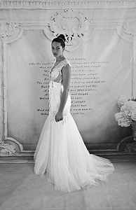 grayscale photography of a woman in tank wedding dress thumbnail