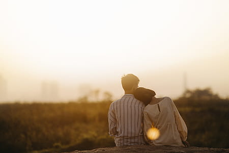 Man and Woman Near Grass Field thumbnail