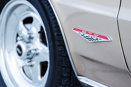 beige and gray vehicle close-up photo thumbnail