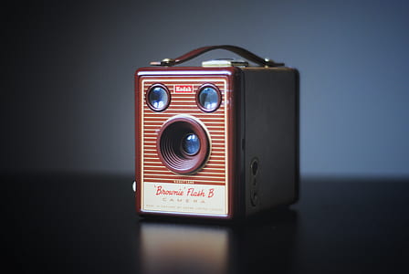 shallow focus photography of brown and gray instant camera thumbnail
