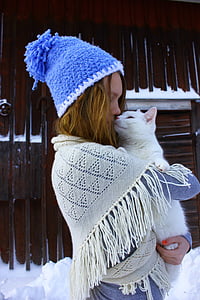 woman carrying white cat thumbnail