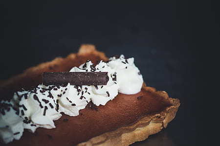chocolate cake with icing and chocolate toppings thumbnail