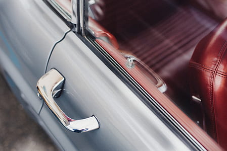 close-up photo of gray vehicle door thumbnail