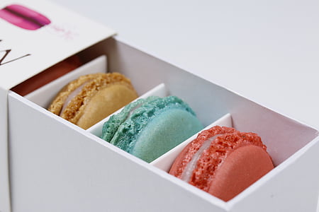 three brown, teal, and red macaroons thumbnail