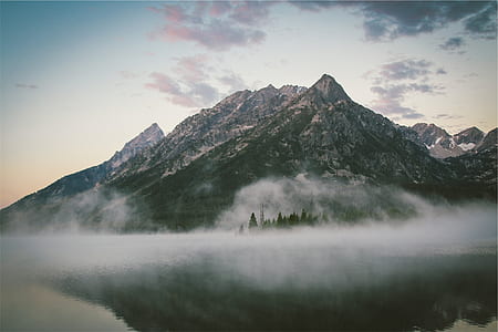 rocky mountain and trees during daytime thumbnail