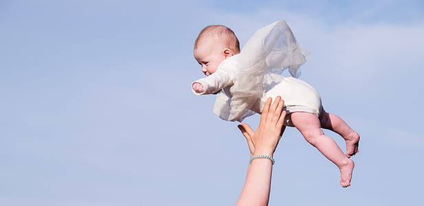 baby being toss on the air thumbnail