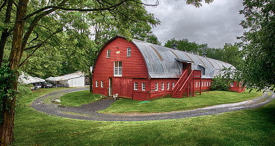 brown and gray wooden barn during daytime thumbnail