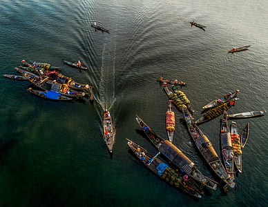 assorted boats on body of water thumbnail