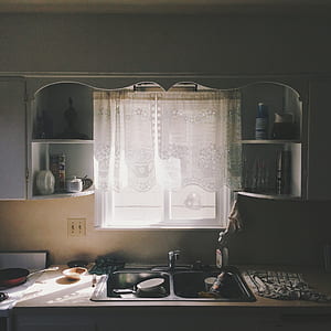 gray metal 2-bowl kitchen sink near windowpane thumbnail