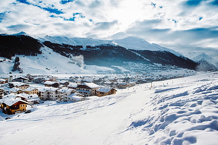 village covered by snow during daytime thumbnail