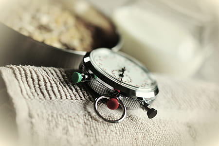 analog stopwatch on gray towel thumbnail