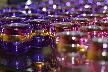 selective focus photography of purple-and-blue glasses thumbnail