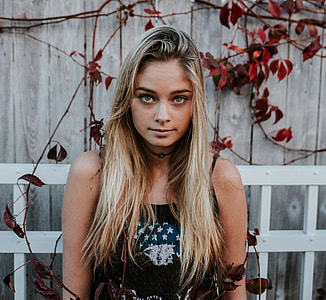 woman' posing for photo outside the house thumbnail