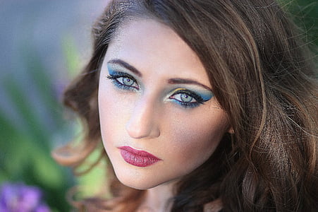 woman in blue eyeshadow in focus photography thumbnail