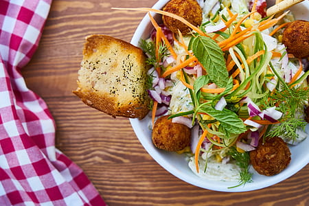 cook food on round white ceramic bowl thumbnail