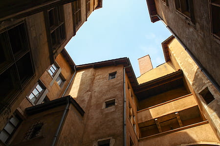 low angle view photography of brown buildings thumbnail