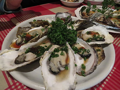 mussel on white ceramic plate thumbnail