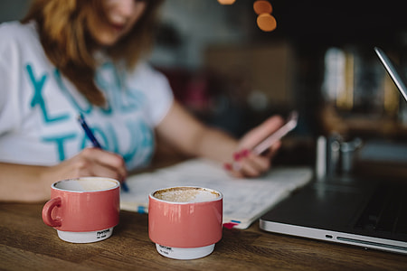 Young woman working in a cafe thumbnail