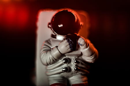person in spacesuit figurine thumbnail