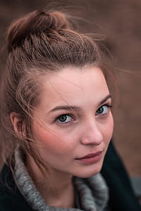 woman wearing gray and black top selective focus photography thumbnail