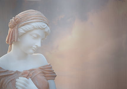 shallow focus photography of white and brown marble statue of woman thumbnail