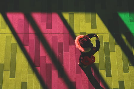 aerial view of person holding his/her phone thumbnail