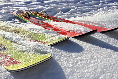 green and red snowboards thumbnail