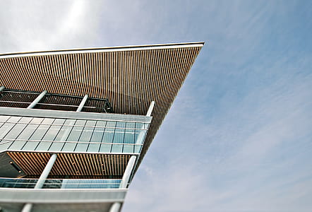 gray concrete building during daytime low angle photography thumbnail