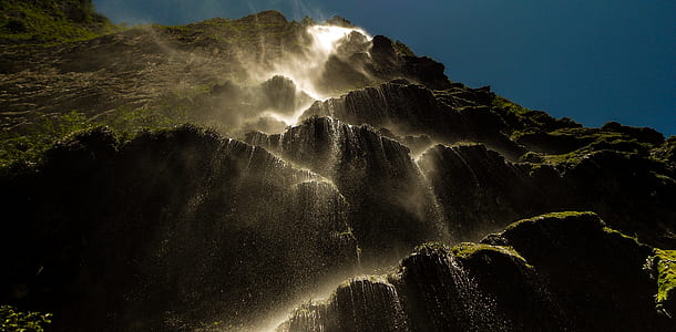 low angle photo of waterfalls thumbnail