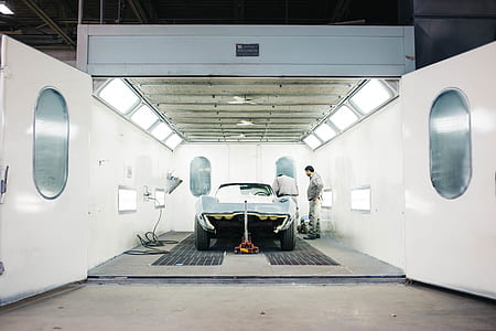 gray car on gray steel surface thumbnail