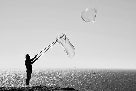 silhouette of man making bubbles thumbnail