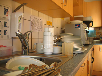 white dinnerware items beside sink in kitchen thumbnail