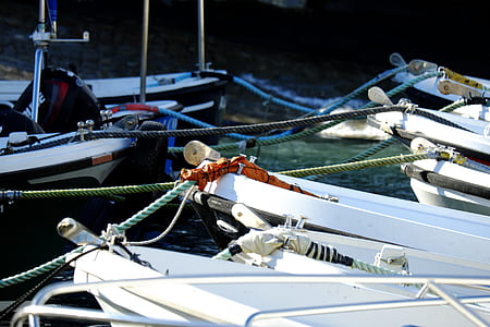 boats on body of water at daytime thumbnail