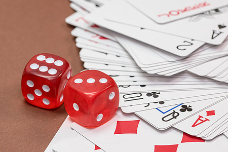 dice showing three and six beside playing cards thumbnail