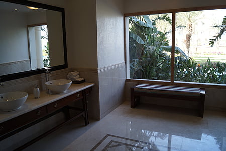 rectangular brown wooden bench near window thumbnail