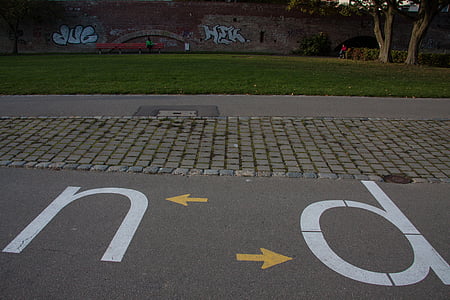 gray concrete road with n and d print paint thumbnail