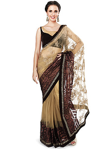 woman wearing black-and-beige floral ghagra choli dress thumbnail