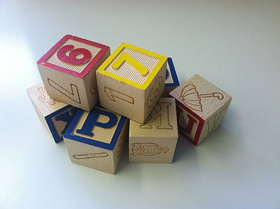assorted-color block on white surface thumbnail