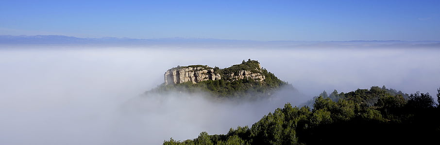 mountain surrounded by clouds thumbnail