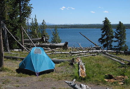 blue dome tent near body of water thumbnail