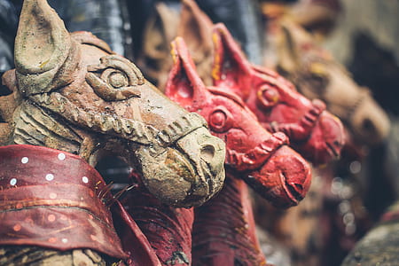 selective focus photo of concrete statues thumbnail