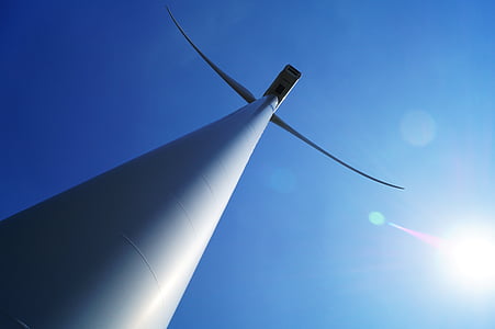 white wind turbine under blue sky thumbnail