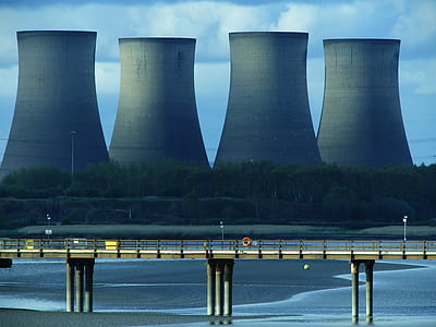 gray concrete bridge near power plant thumbnail