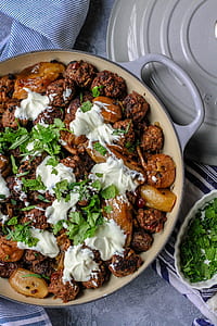 flat-lay photo of meat balls top with parsley thumbnail