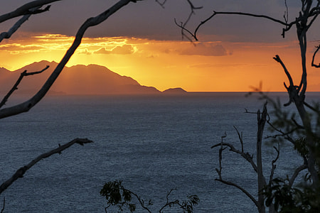 blue sea during sunset thumbnail