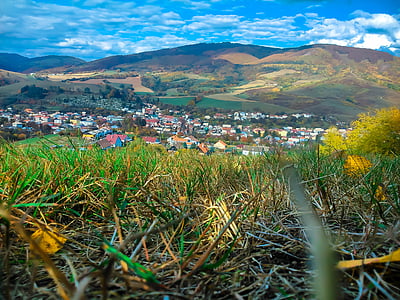 city under white cloud and blue sky during daytime thumbnail