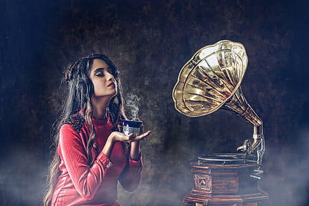 woman near gramophone thumbnail